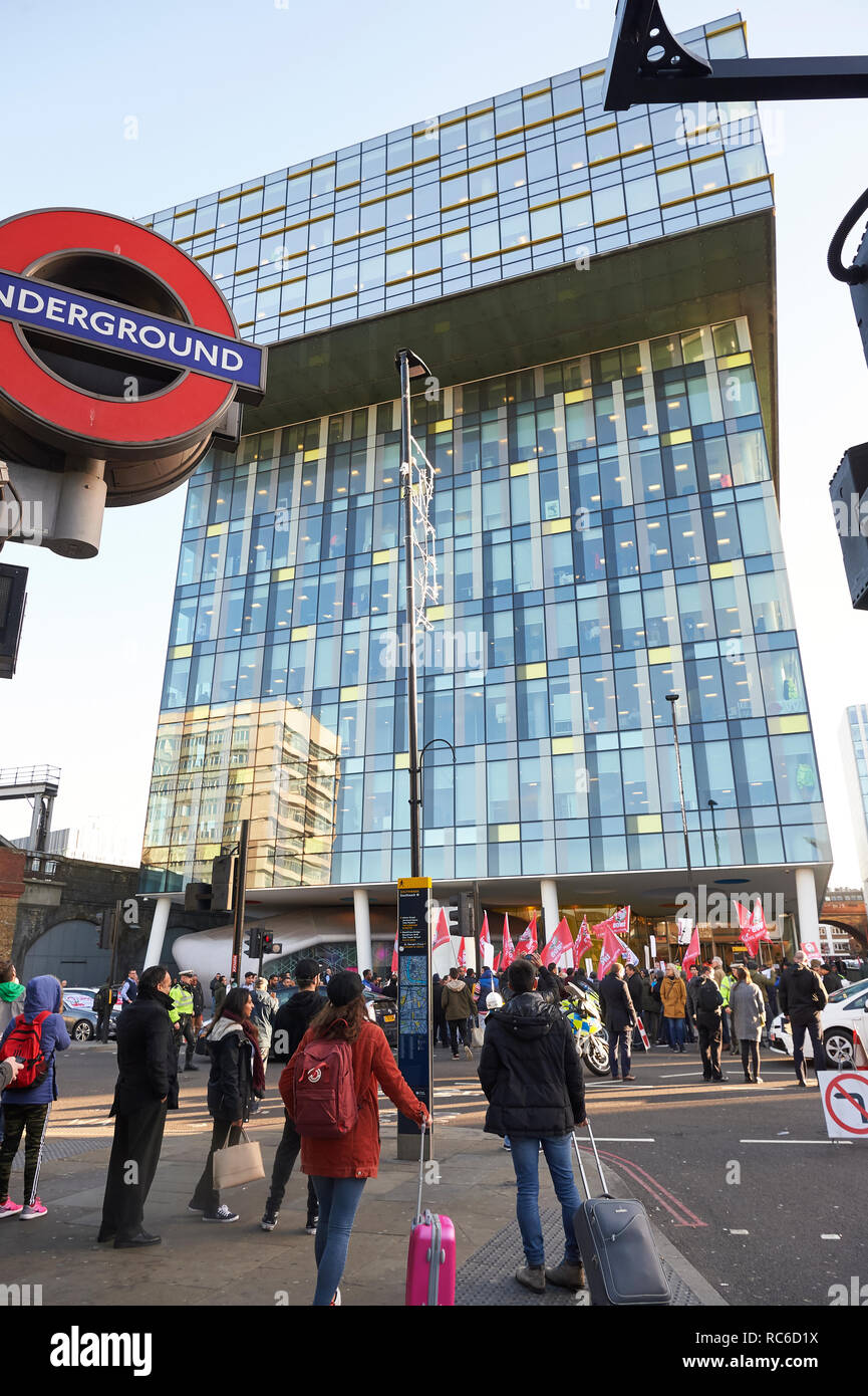 London, UK. 14th Jan 2019. Minicab drivers take part in a protest outside the offices of Transport for London, Southwark, organised by the Independent Workers Union of Great Britain's and United Private Hire Drivers branch following last months introduction of congestion charges for minicabs. Credit: Thomas Bowles/Alamy Live News Stock Photo