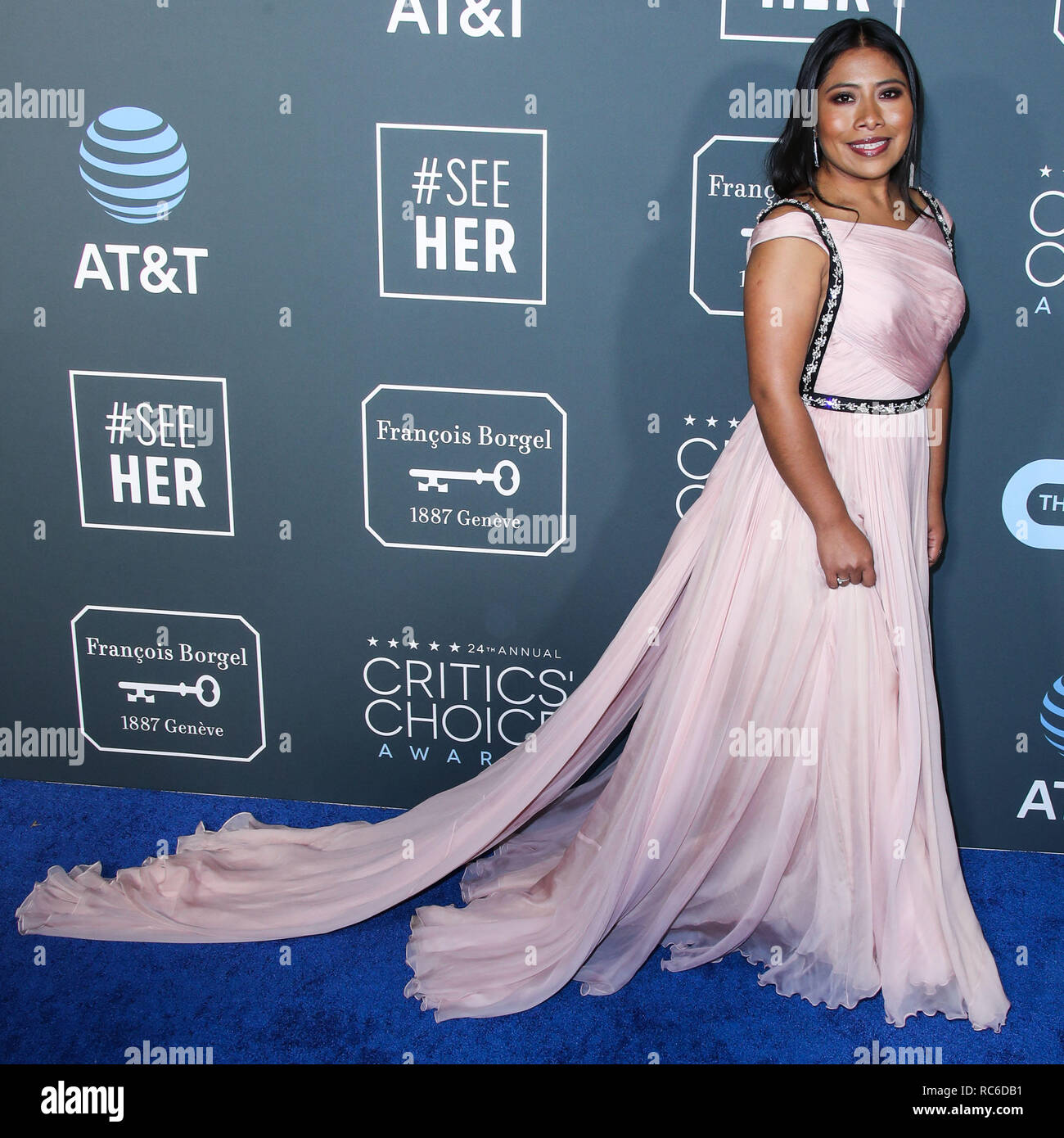 Santa Monica, United States. 13th Jan, 2019. Actress Yalitza Aparicio  wearing a Prada dress and clutch, Anabela Chan earrings, and rings from  Marli New York and Kallati arrives at the 24th Annual