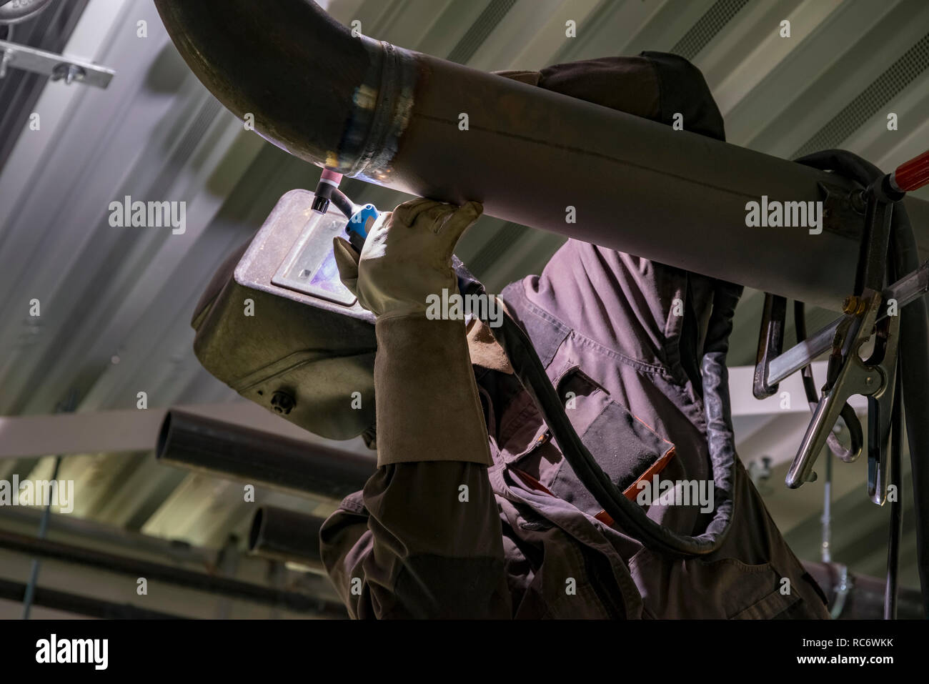 low angle view showing a welder at work Stock Photo