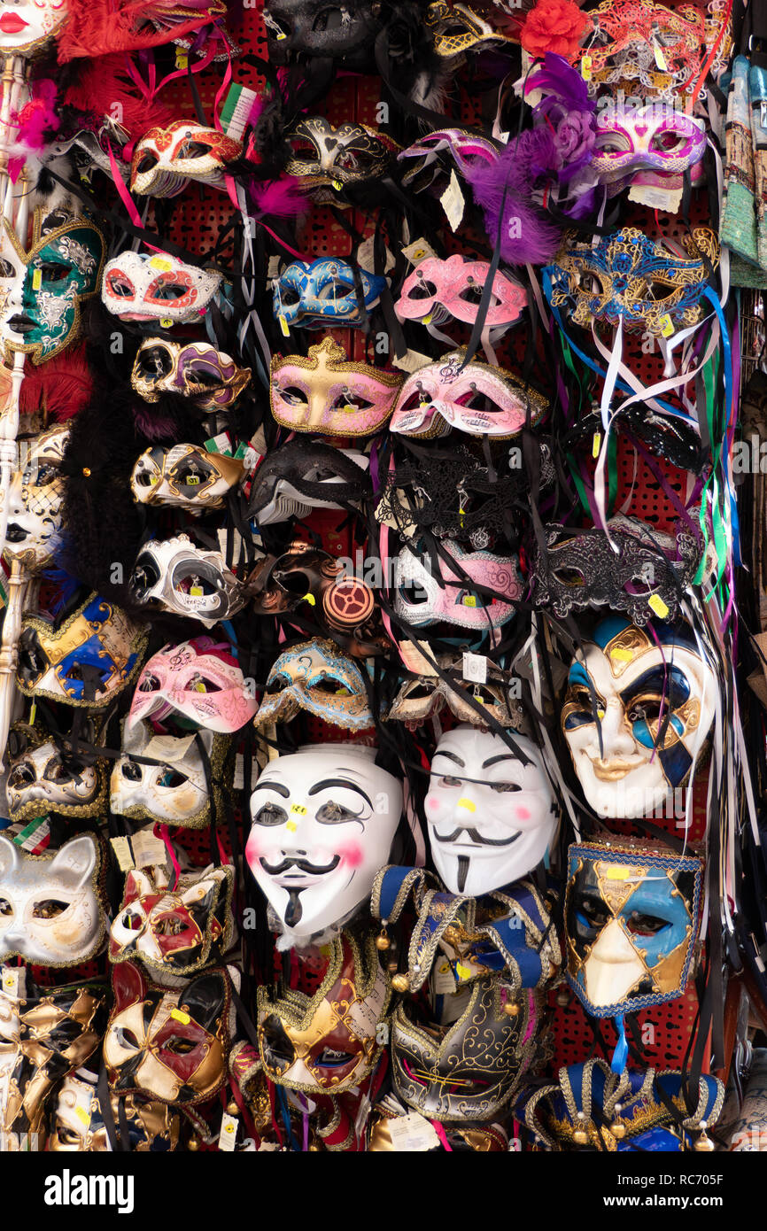 Stall selling gifts and Carnival masks in Venice, Italy. Travel and Italian urban landscape in Venezia, Italia with tourist attraction for people Stock Photo