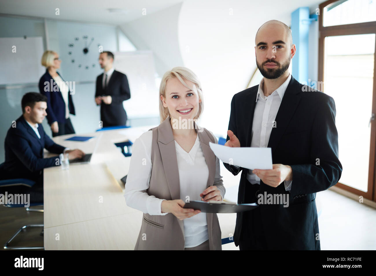 Brokers with papers Stock Photo Alamy