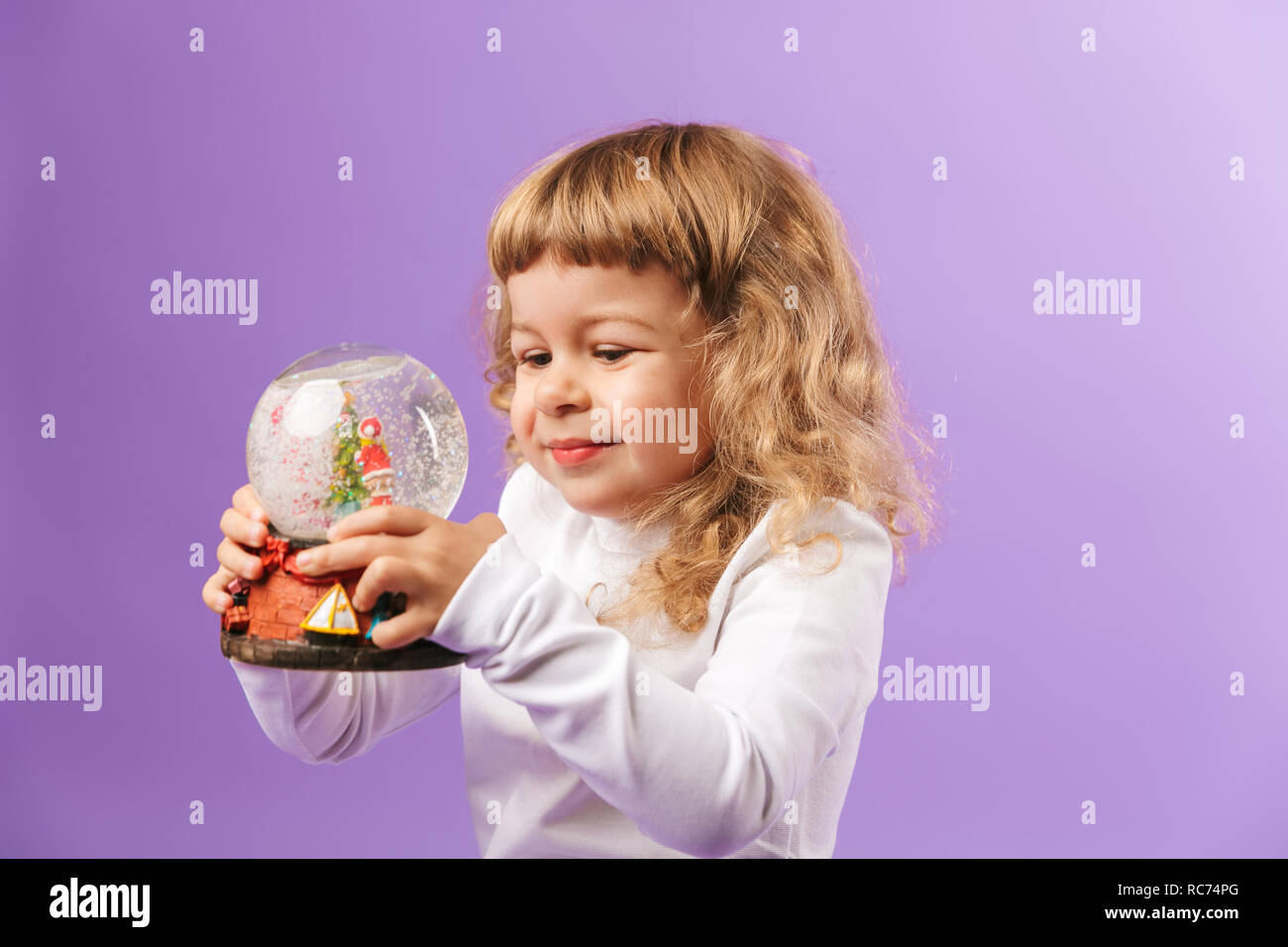 little girl snow globe