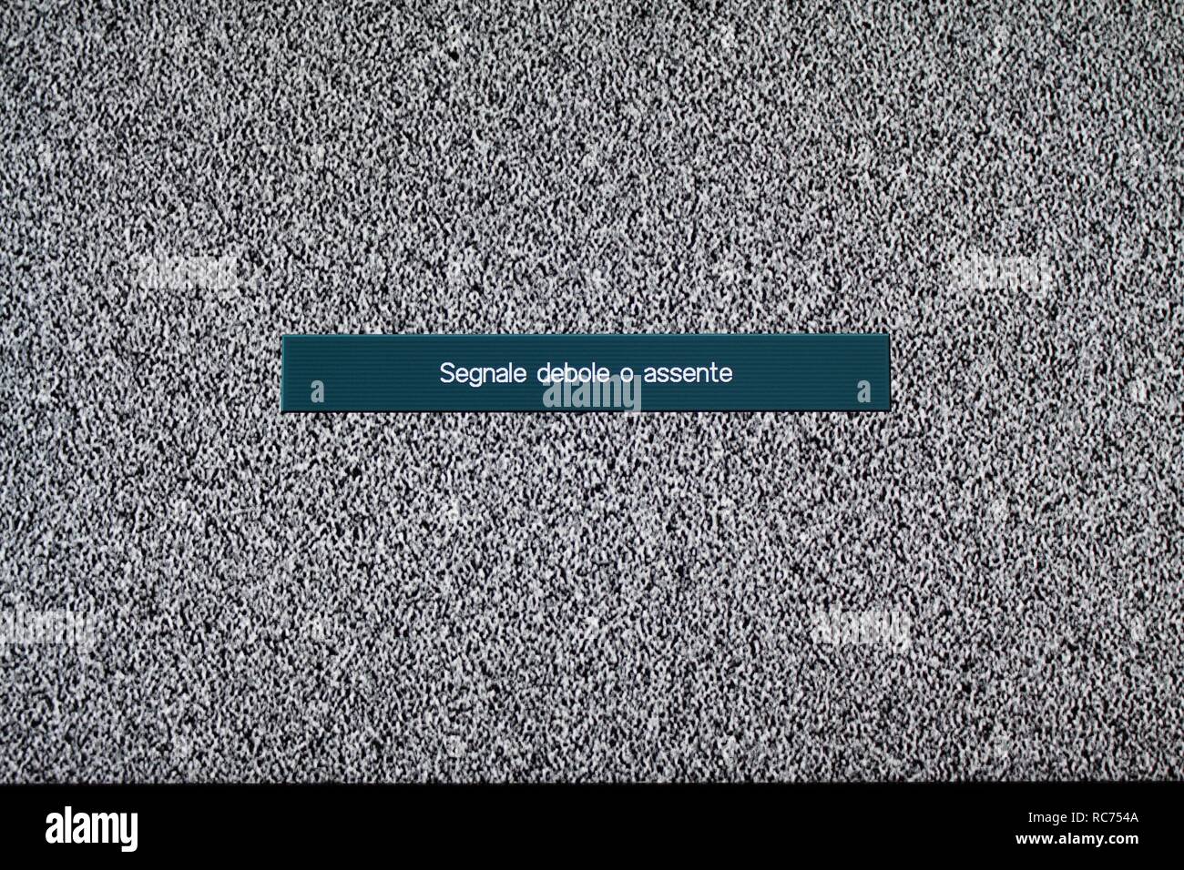 TV and remote control. White noise. Searching, installing or checking