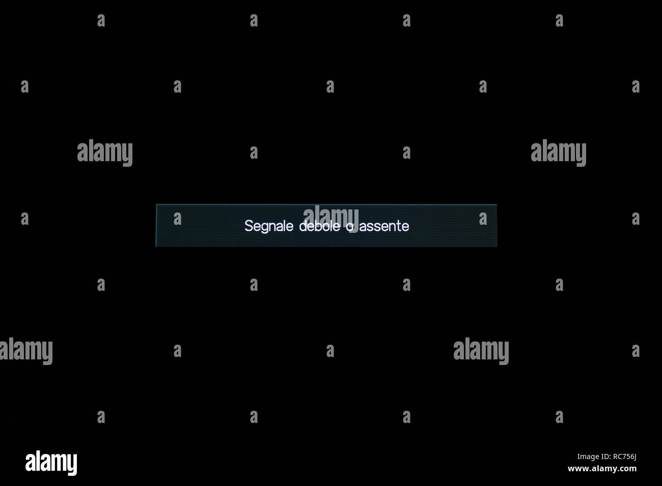 TV and remote control. White noise. Searching, installing or checking