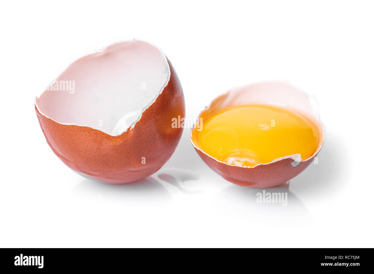 broken chicken egg on white isolated background Stock Photo - Alamy