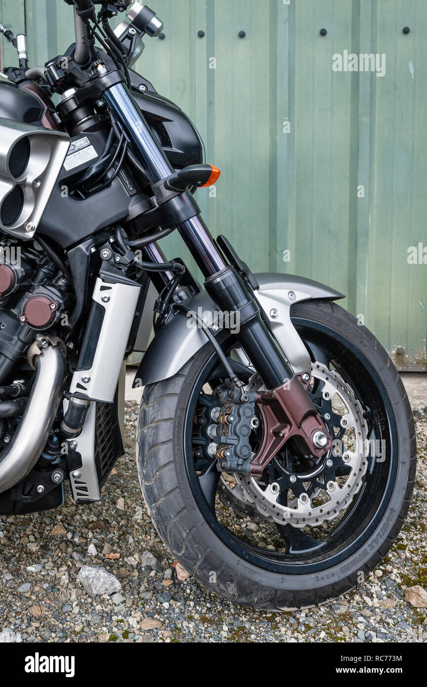 UK. Yamaha VMAX motorcycle, with a 4-cylinder liquid cooled 1679cc V4 engine. Front wheel, forks and shock absorbers, closeup Stock Photo