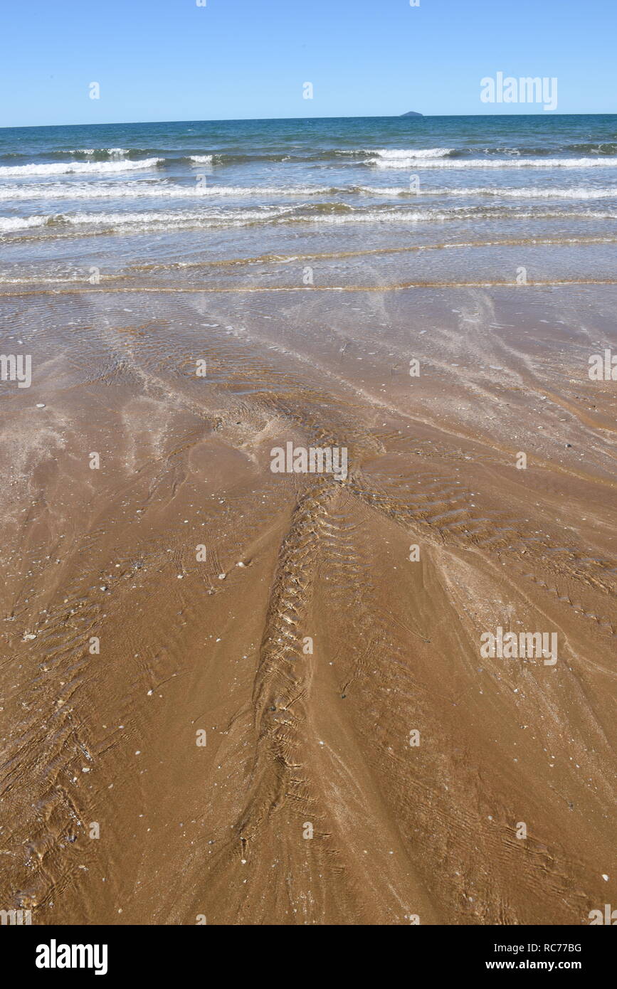 Waves and tides, Sarina Beach Stock Photo Alamy