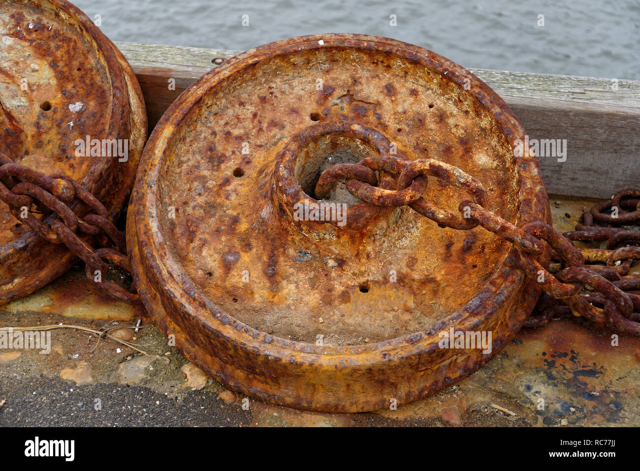 Metal weights for sea moorings and buoys. Stock Photo