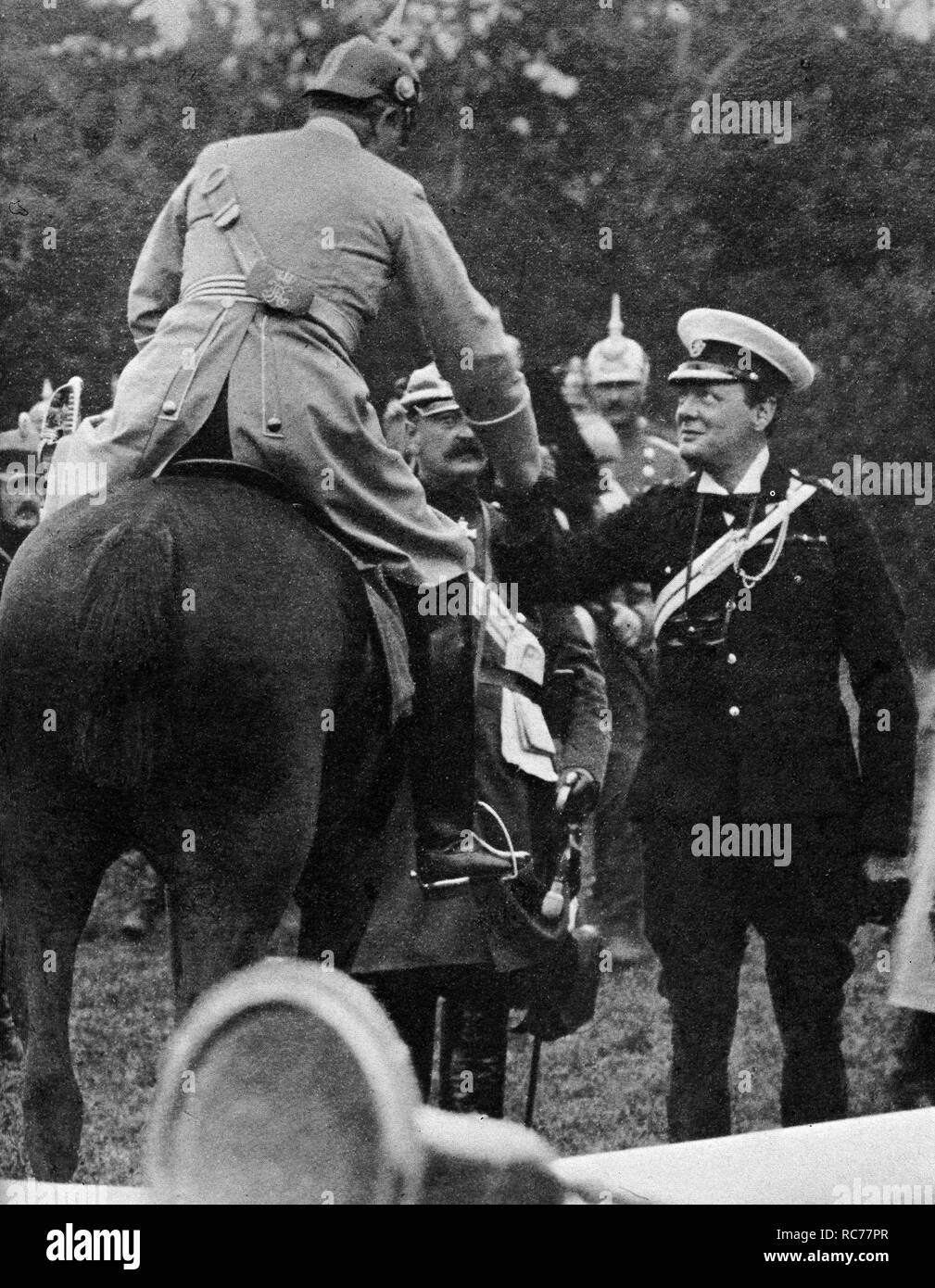 Winston Churchill shaking hands with Kaiser Wilhelm while on manoeuvres in Germany .1909 Stock Photo