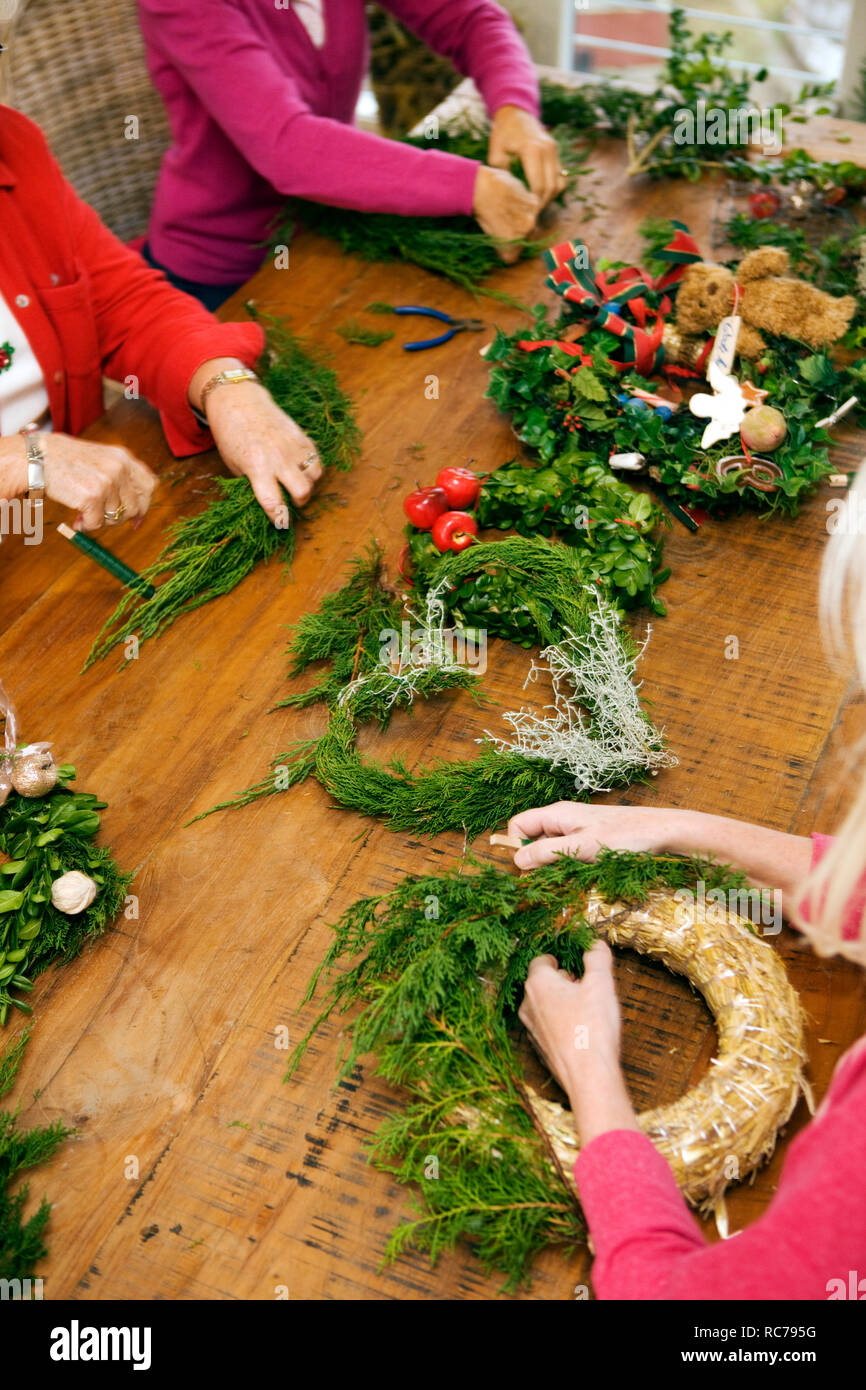 Women making Christmas ornament Stock Photo