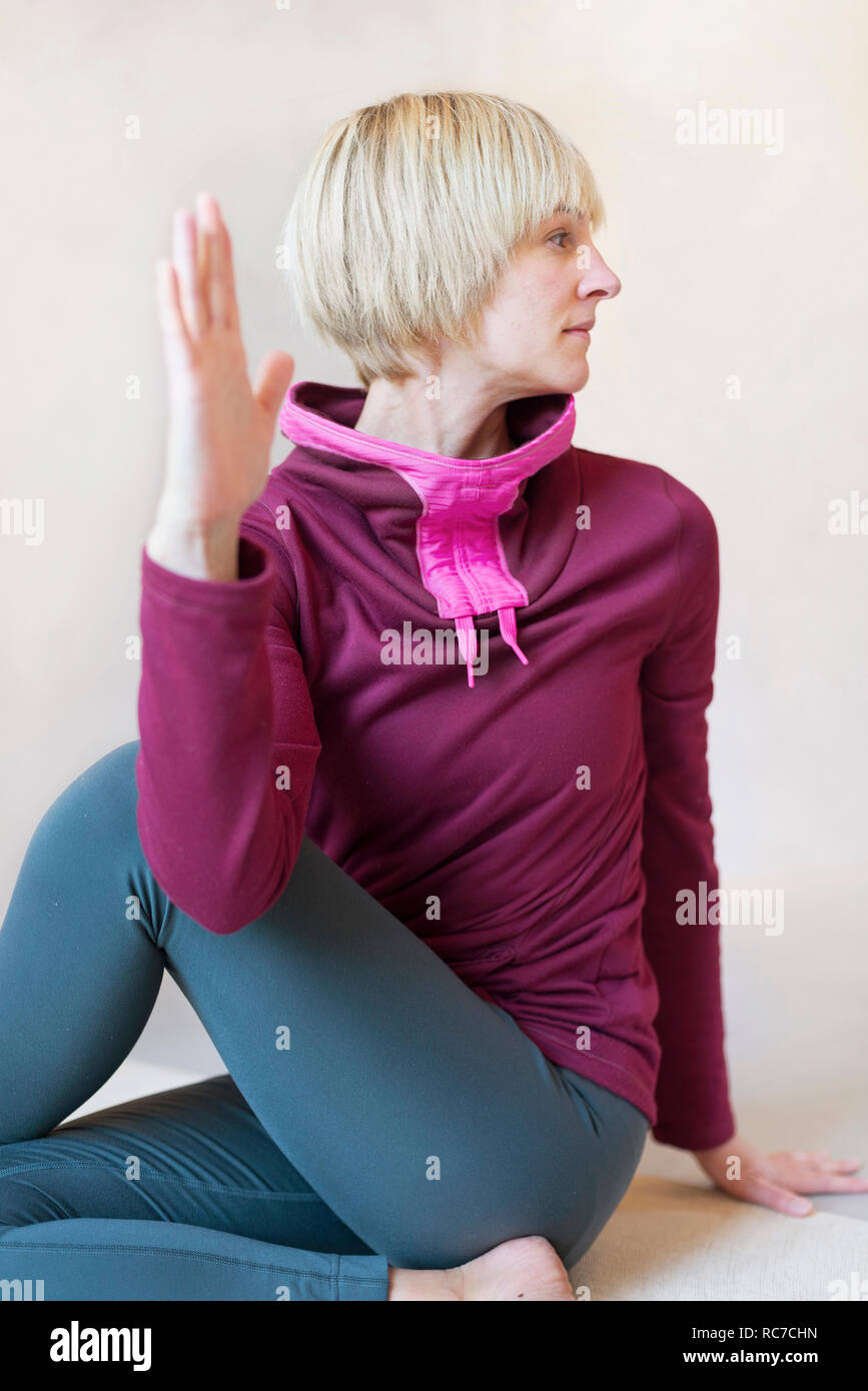 Young woman stretching Stock Photo