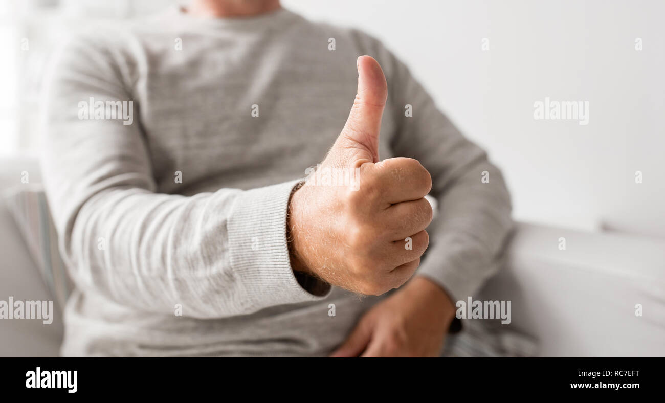 Mature man showing thumbs up hi-res stock photography and images - Alamy