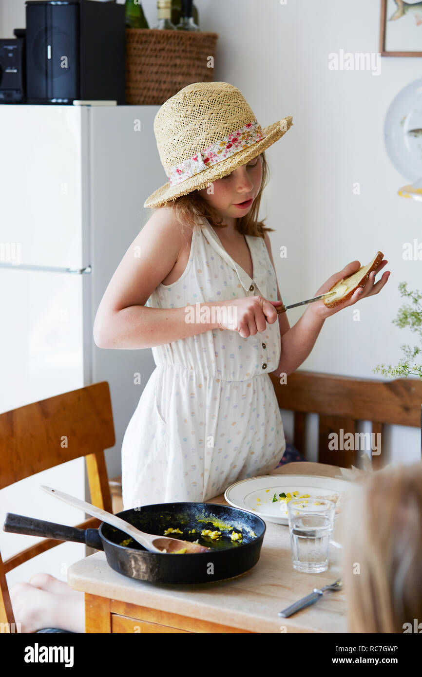 Applying butter hi-res stock photography and images - Alamy