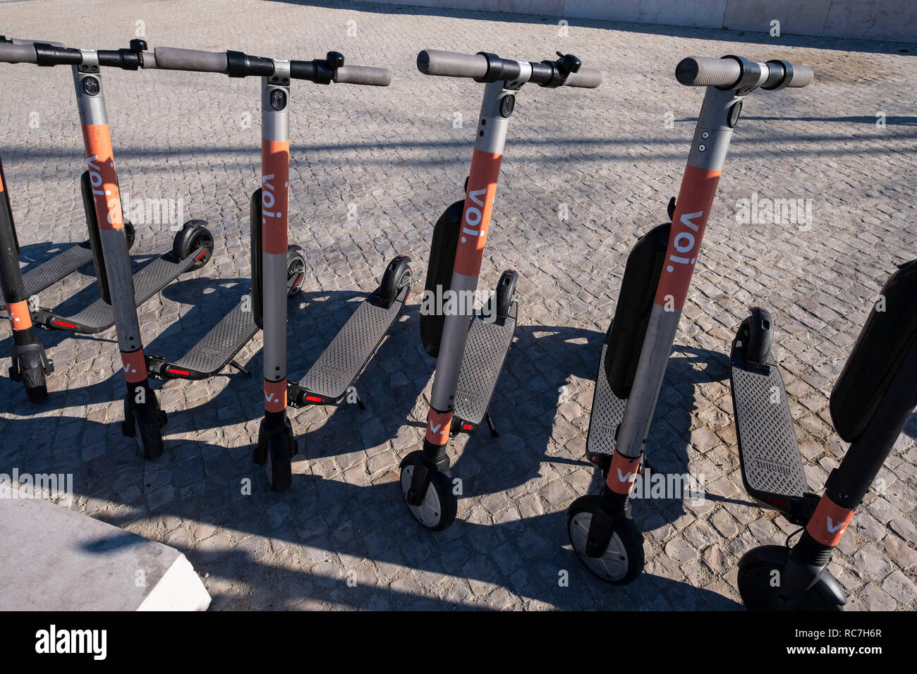 VOI dockless electric scooters for rental Stock Photo