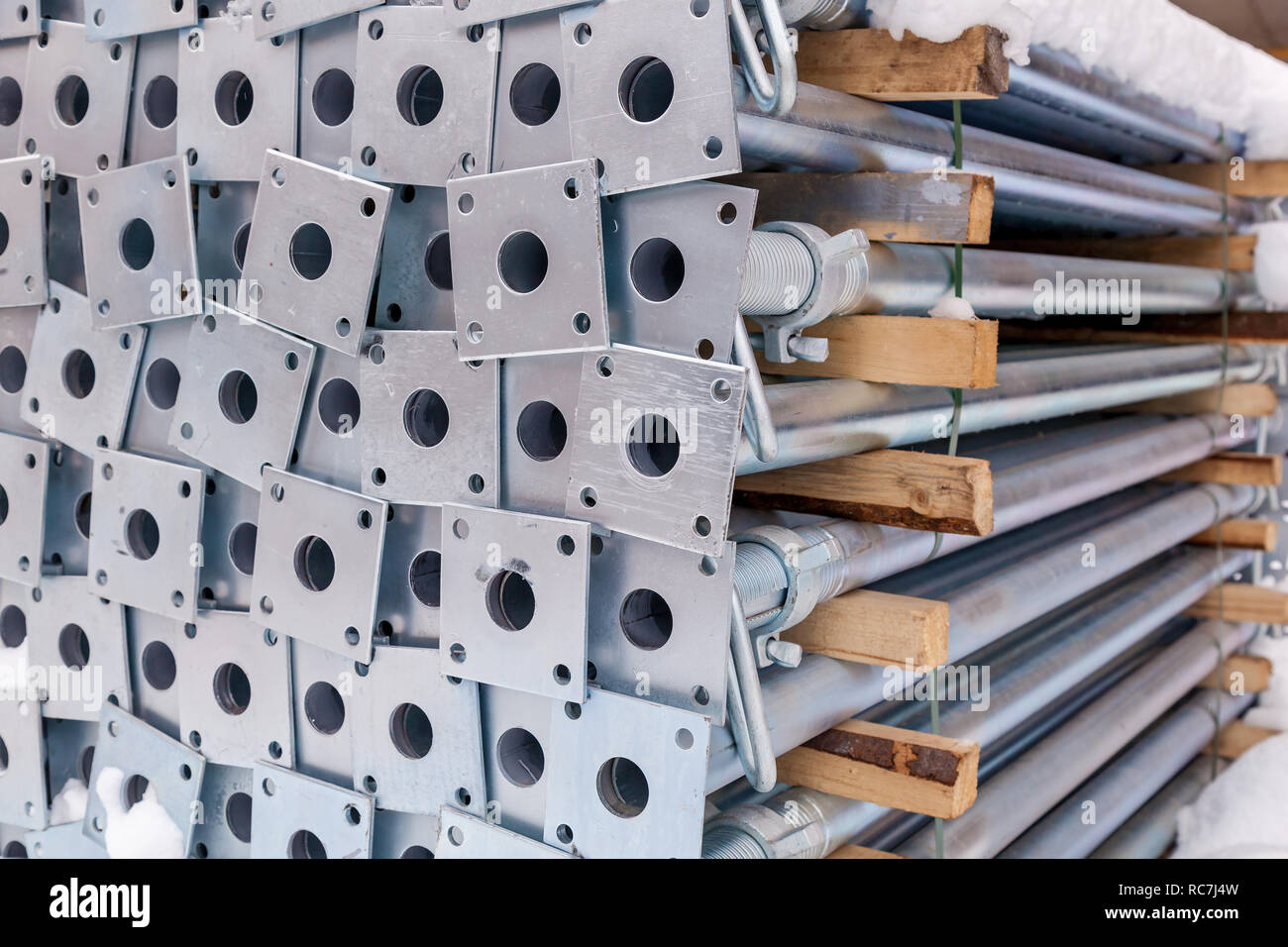 metal structures in a warehouse in stacks. metal supports for