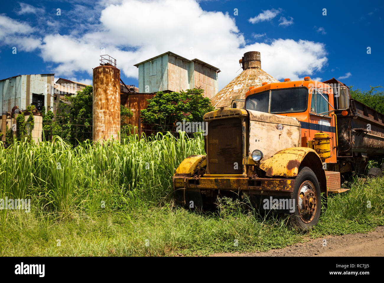 Rusty truck in front of Old Koloa Sugar Mill, Kauai, Hawaii Stock Photo