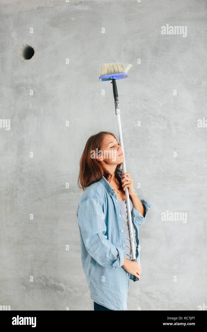 Holding paint brush hi-res stock photography and images - Alamy