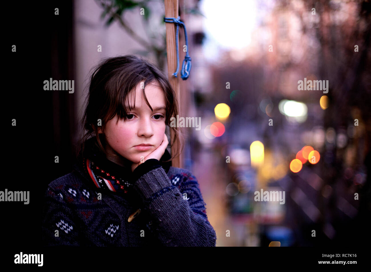 10 Year Old Boy Looking Thoughtful On Balcony Stock Photo Alamy