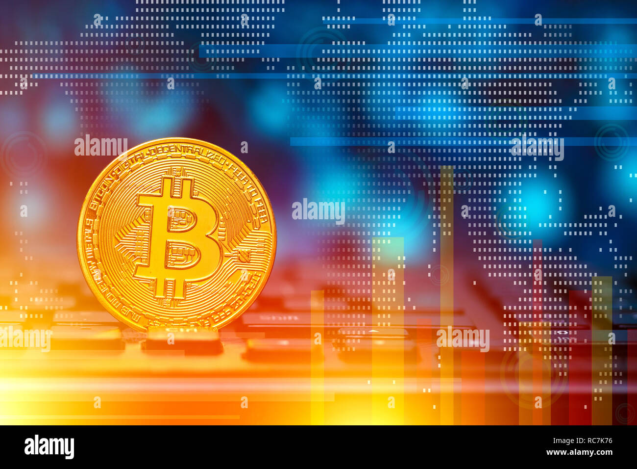 Cryptocurrency Bitcoin on keyboard with finances elements on background.  Blockchain technology concept Stock Photo - Alamy