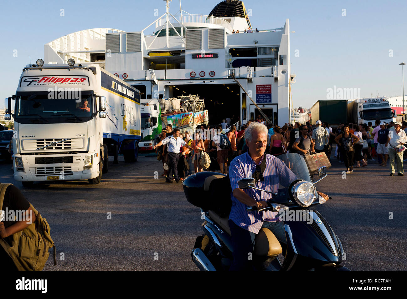 passengers disembarking from a ferry in port of Piraeus, Greece Stock Photo