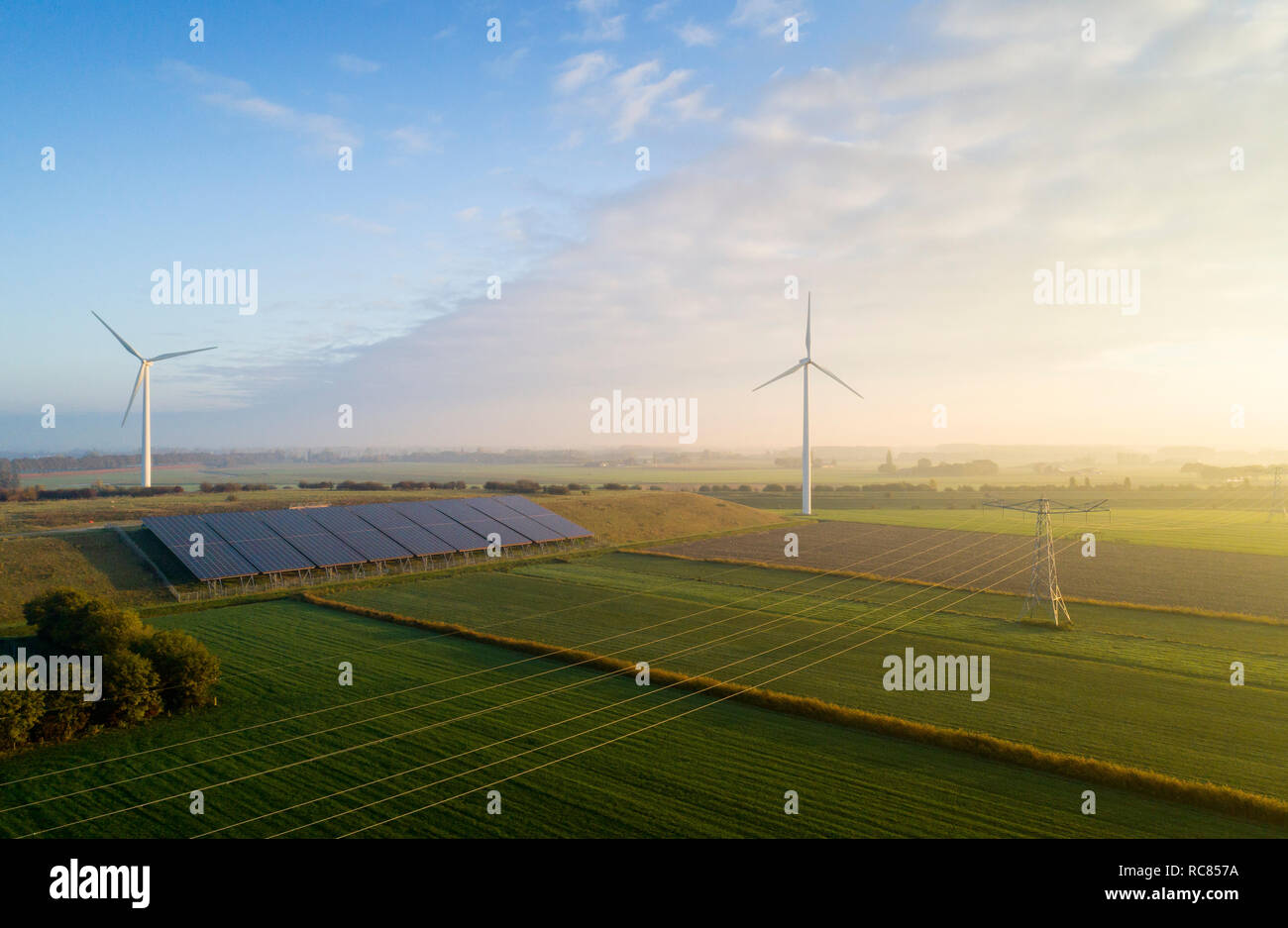 Field landscape with wind turbines and solar farm located on former waste dump, elevated view, Netherlands Stock Photo