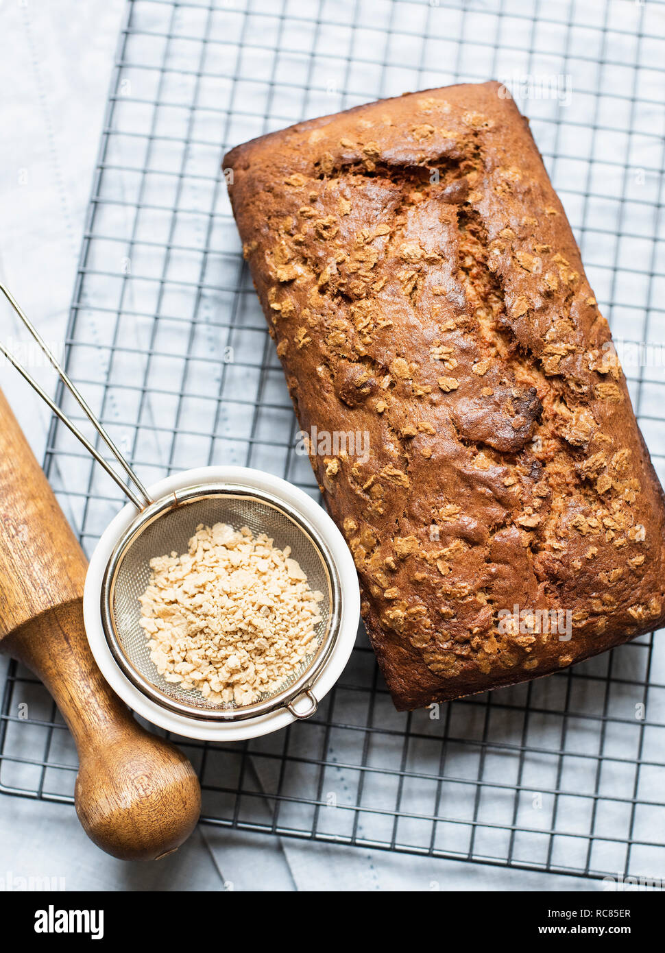 Banana bread on cooling rack and maple flakes Stock Photo Alamy