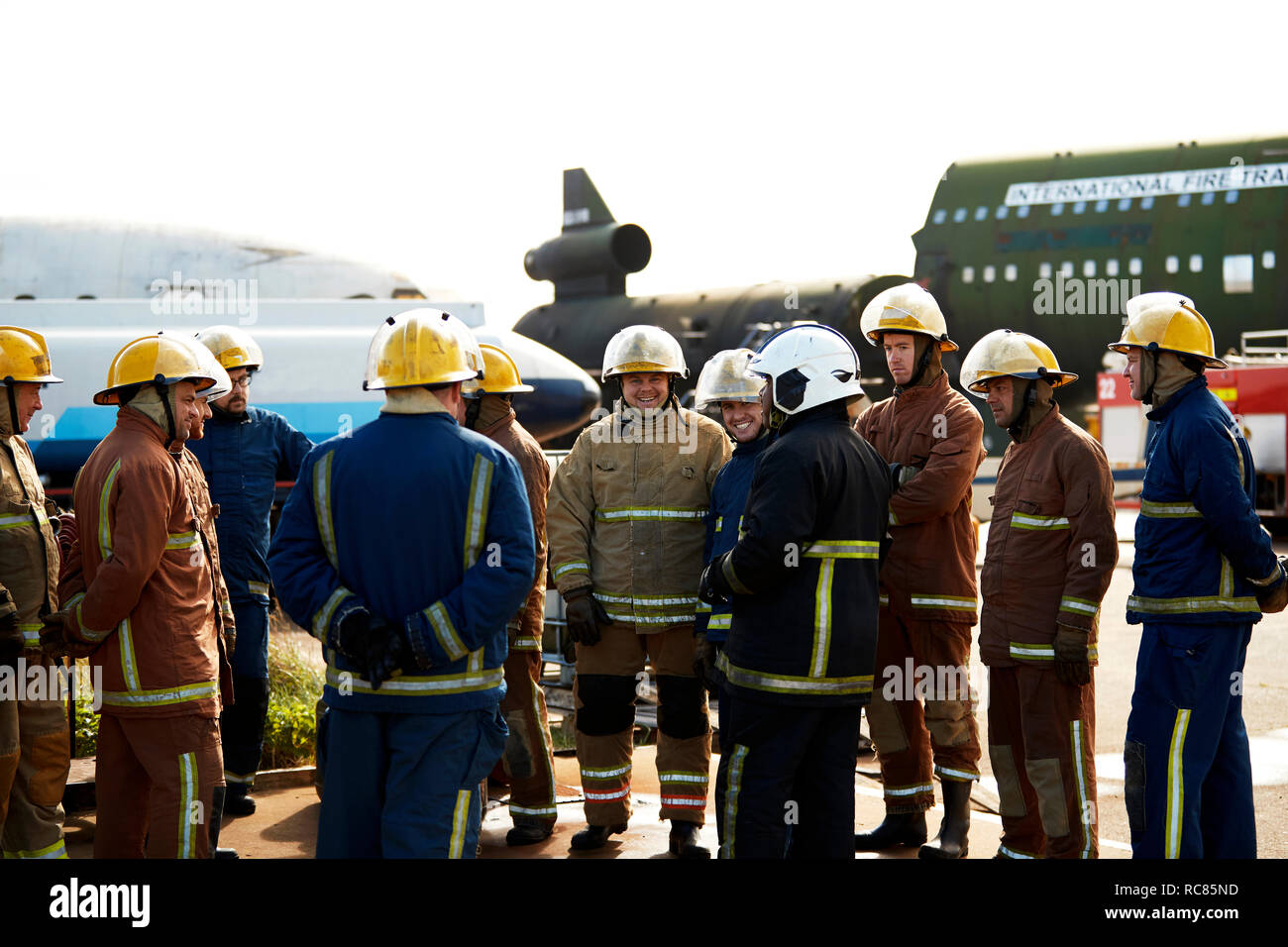 Firemen training, large group of firemen listening to supervisor Stock Photo
