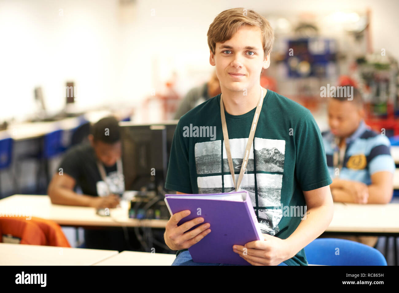 Teenage male higher education student in college classroom, portrait Stock Photo