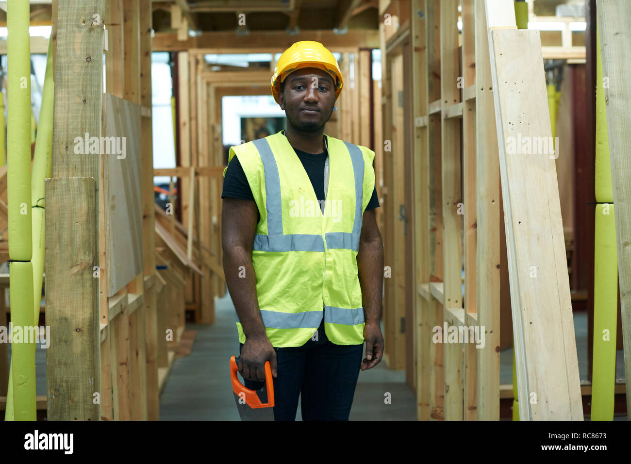 Male higher education carpentry student in college workshop, portrait Stock Photo