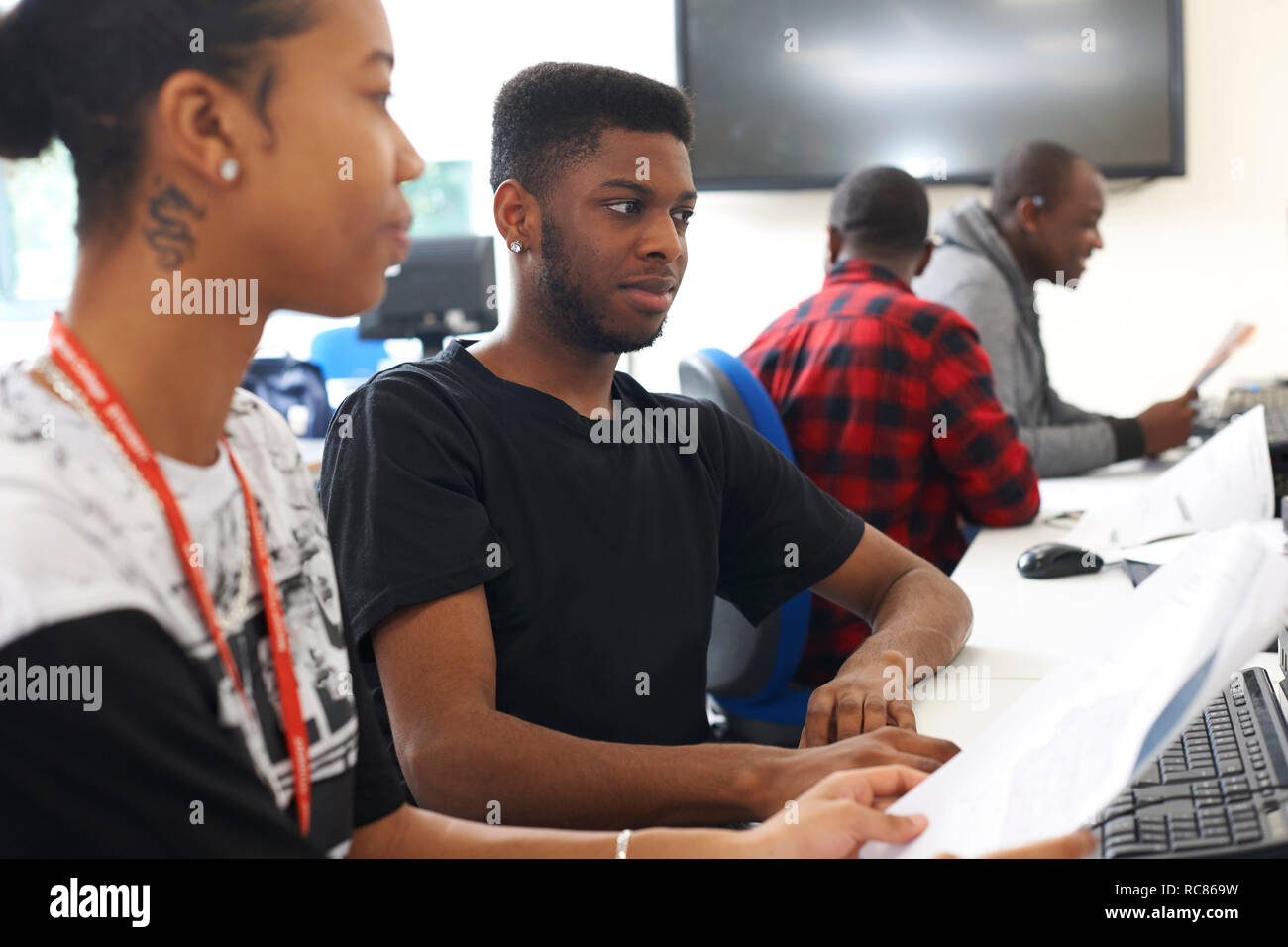 College students studying in classroom Stock Photo