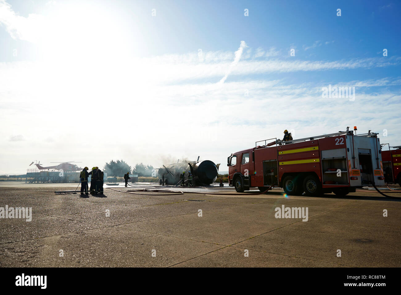 Firemen and fire engine in training centre, Darlington, UK Stock Photo
