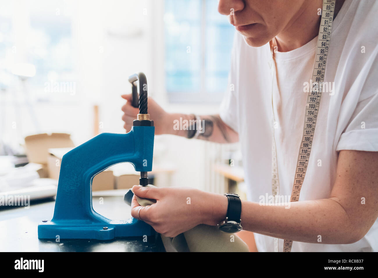 Fashion designer working in her studio Stock Photo