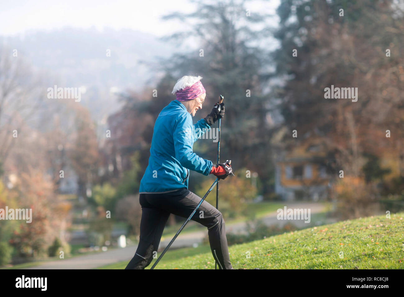 Woman nordic walking hi-res stock photography and images - Alamy