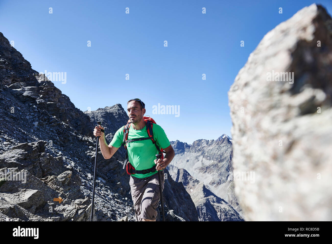 Hiker in Mont Cervin, Matterhorn, Valais, Switzerland Stock Photo