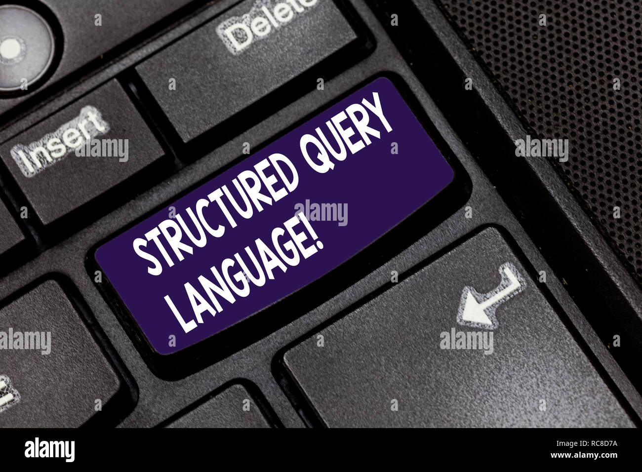 Writing note showing Structured Query Language. Business photo showcasing computer language for relational database Keyboard key Intention to create c Stock Photo