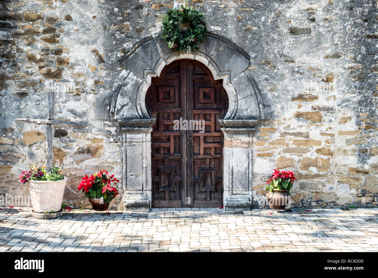 Entrance door to Mission Espada in San Antonio Texas on a bright sunny