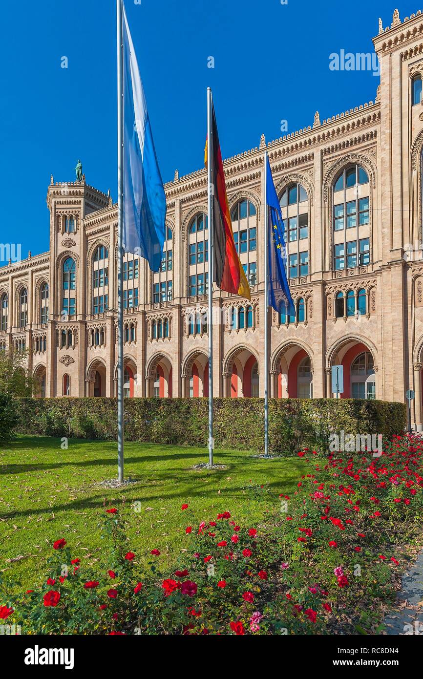 Facade, flags in front of government of Upper Bavaria, Munich, Upper Bavaria, Bavaria, Germany Stock Photo