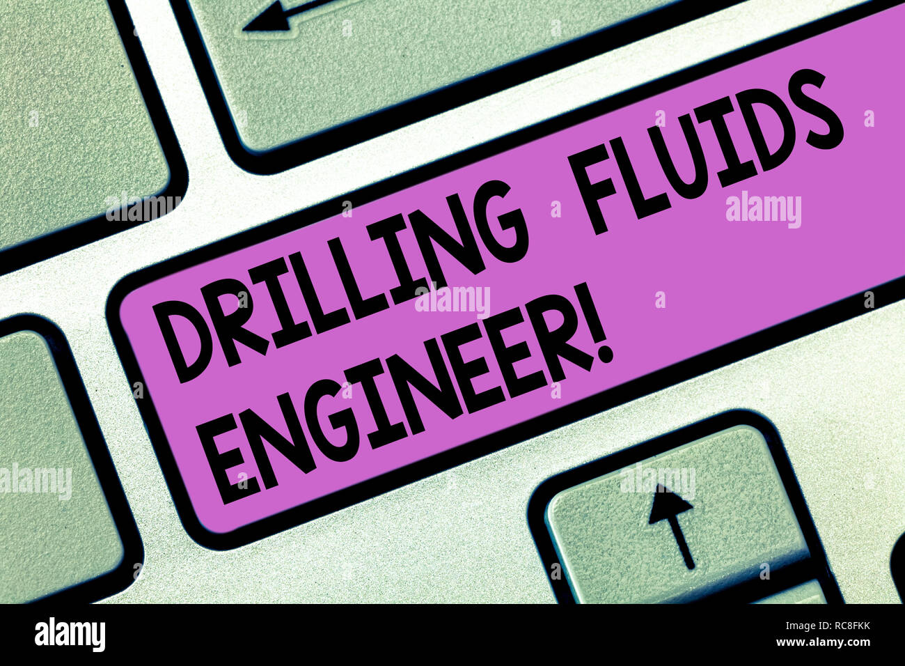 Handwriting text Drilling Fluids Engineer. Concept meaning A demonstrating in charge for testing the mud at a rig Keyboard key Intention to create com Stock Photo