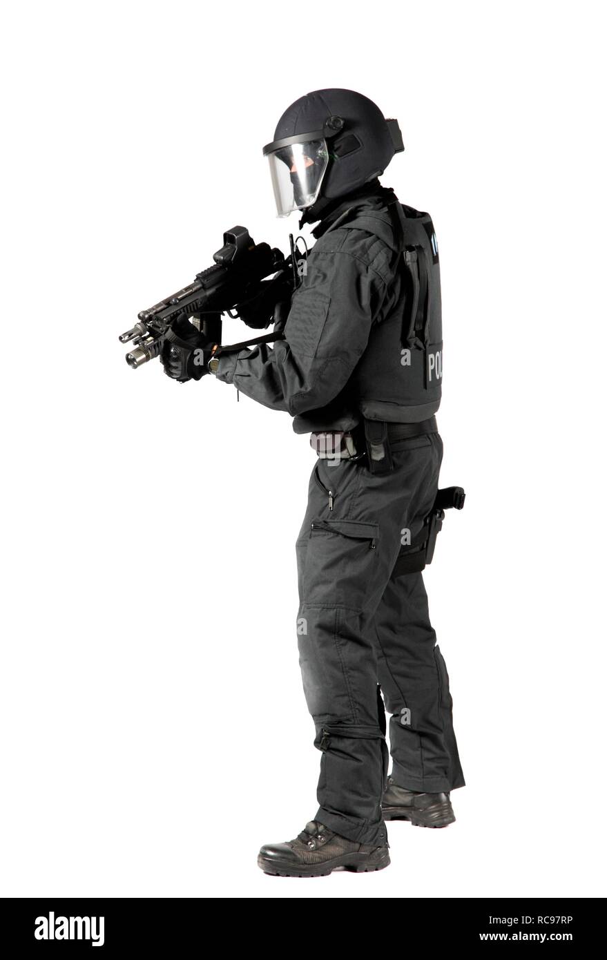 Police, Special Task Force, SEK, officer wearing full protective uniform holding a Heckler & Koch MP5 submachine gun Stock Photo