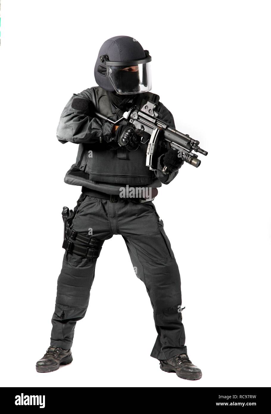Police, Special Task Force, SEK, officer wearing full protective uniform holding a Heckler & Koch MP5 submachine gun Stock Photo
