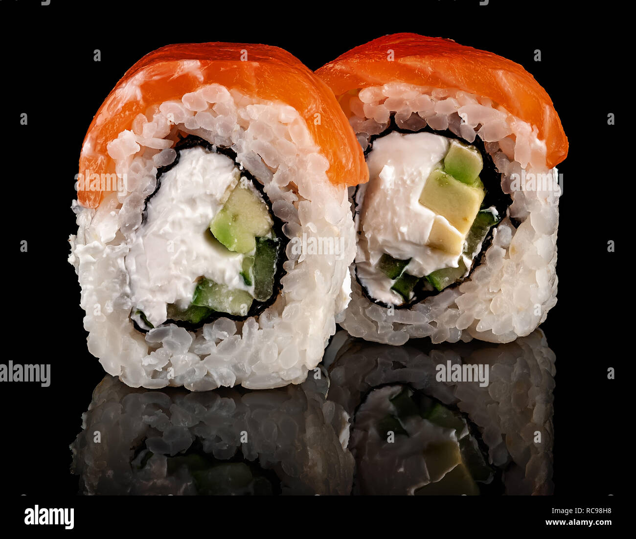 Two pieces of sushi rolls Philadelphia Stock Photo
