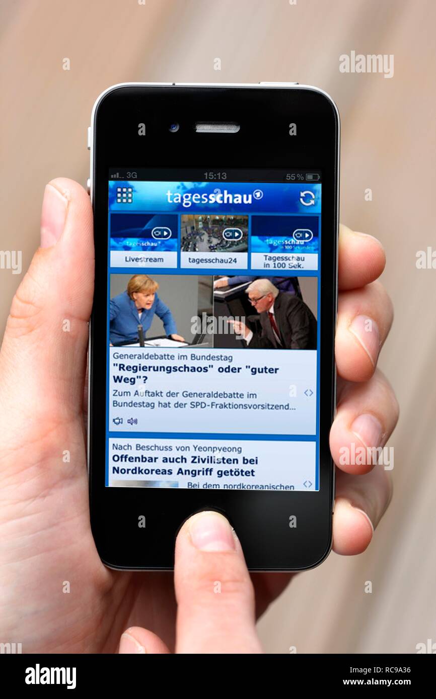 Iphone, smartphone, app on the screen, ARD Tagesschau, a German news magazine Stock Photo