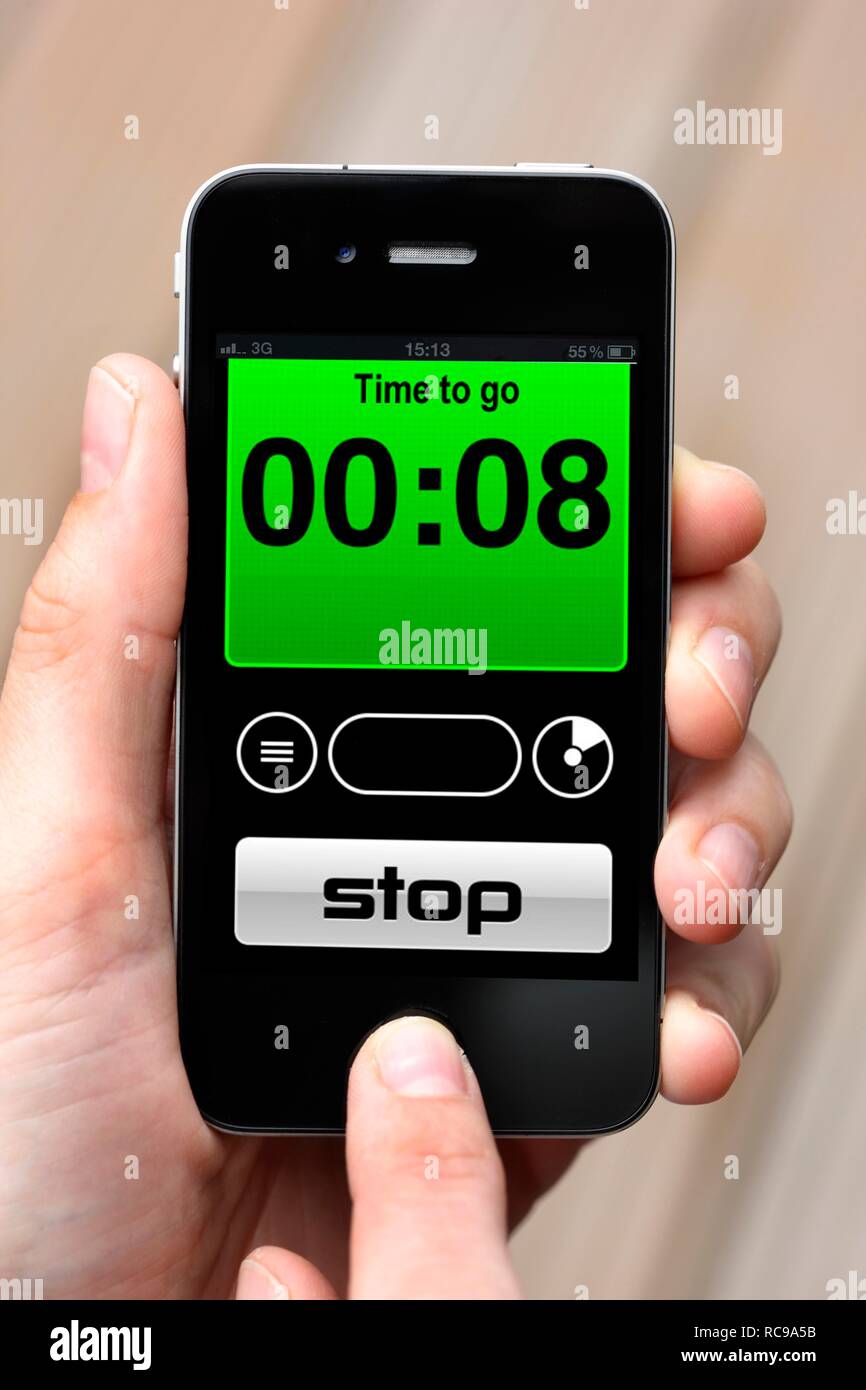 Iphone, smart phone, timer, alarm clock, stopwatch app on the screen Stock Photo