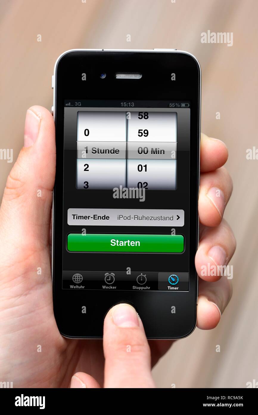 Iphone, smart phone, app on the screen, timer, alarm clock, stopwatch Stock Photo