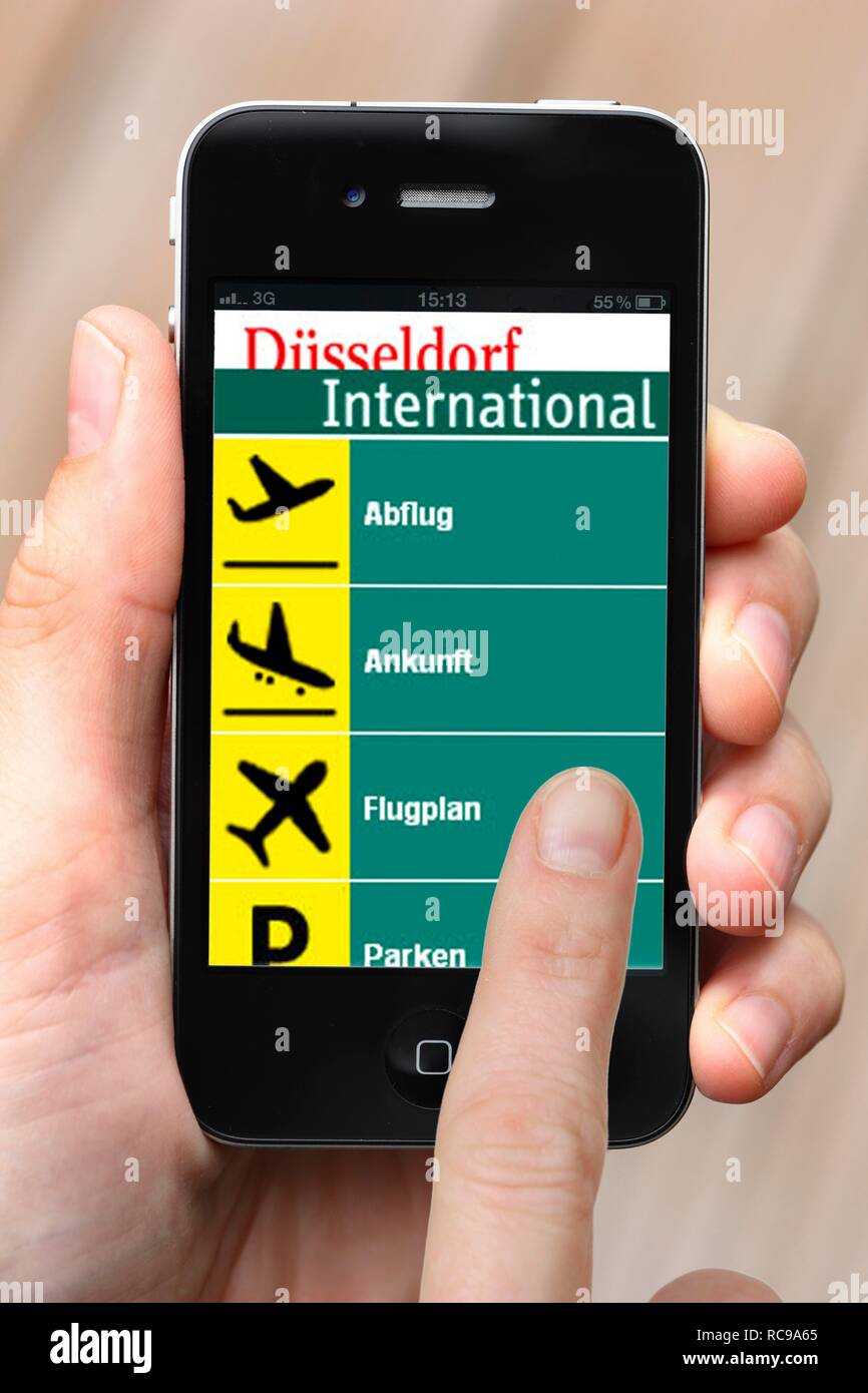 Iphone, smart phone, app on the screen, departures, arrivals, and flight connections, Duesseldorf International Airport Stock Photo