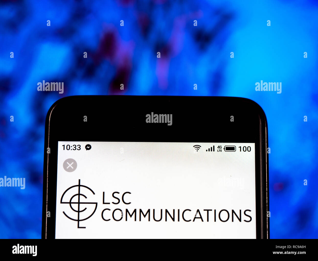 LSC Communications Printing company logo seen displayed on smart phone ...