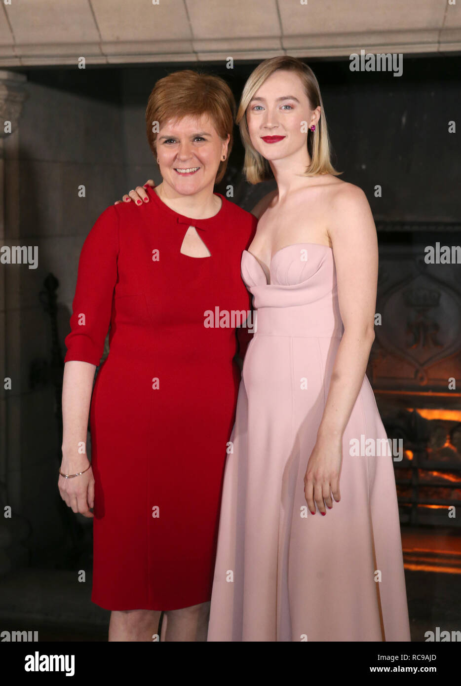 First Minister Nicola Sturgeon and actress Saoirse Ronan arriving at the Scottish premiere of Mary Queen of Scots at Edinburgh Castle. Stock Photo