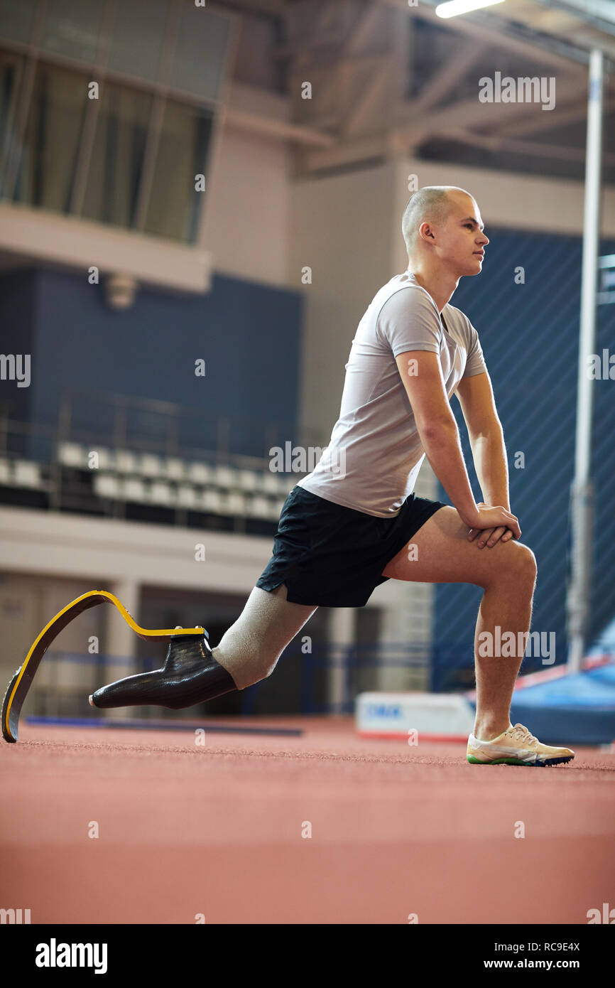 Gym exercise man leg stretching hi-res stock photography and images - Alamy