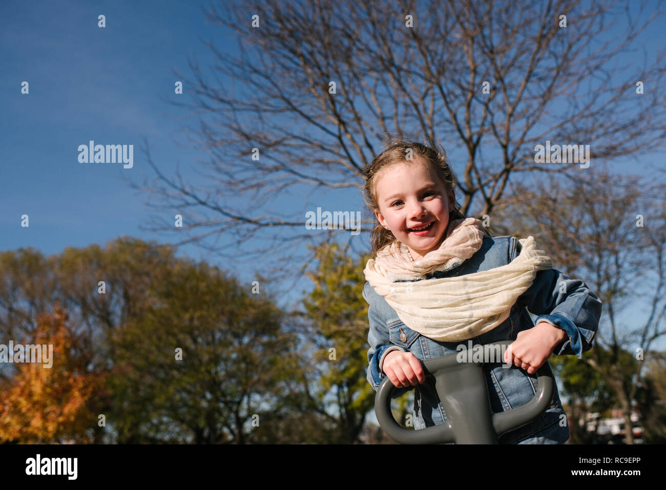 Little girl playing in park Stock Photo