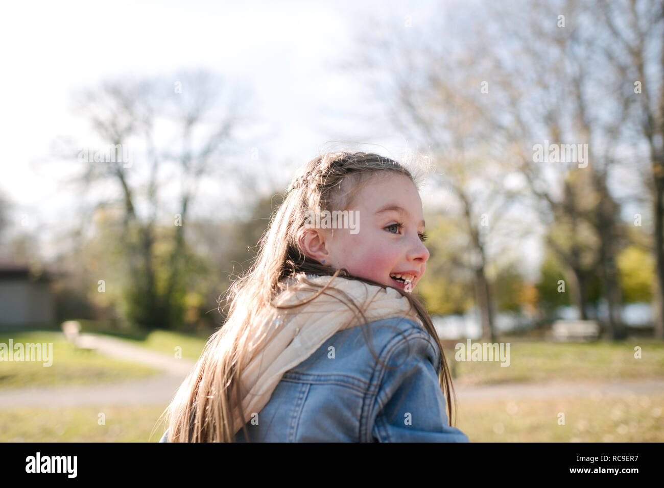 Little girl playing in park Stock Photo